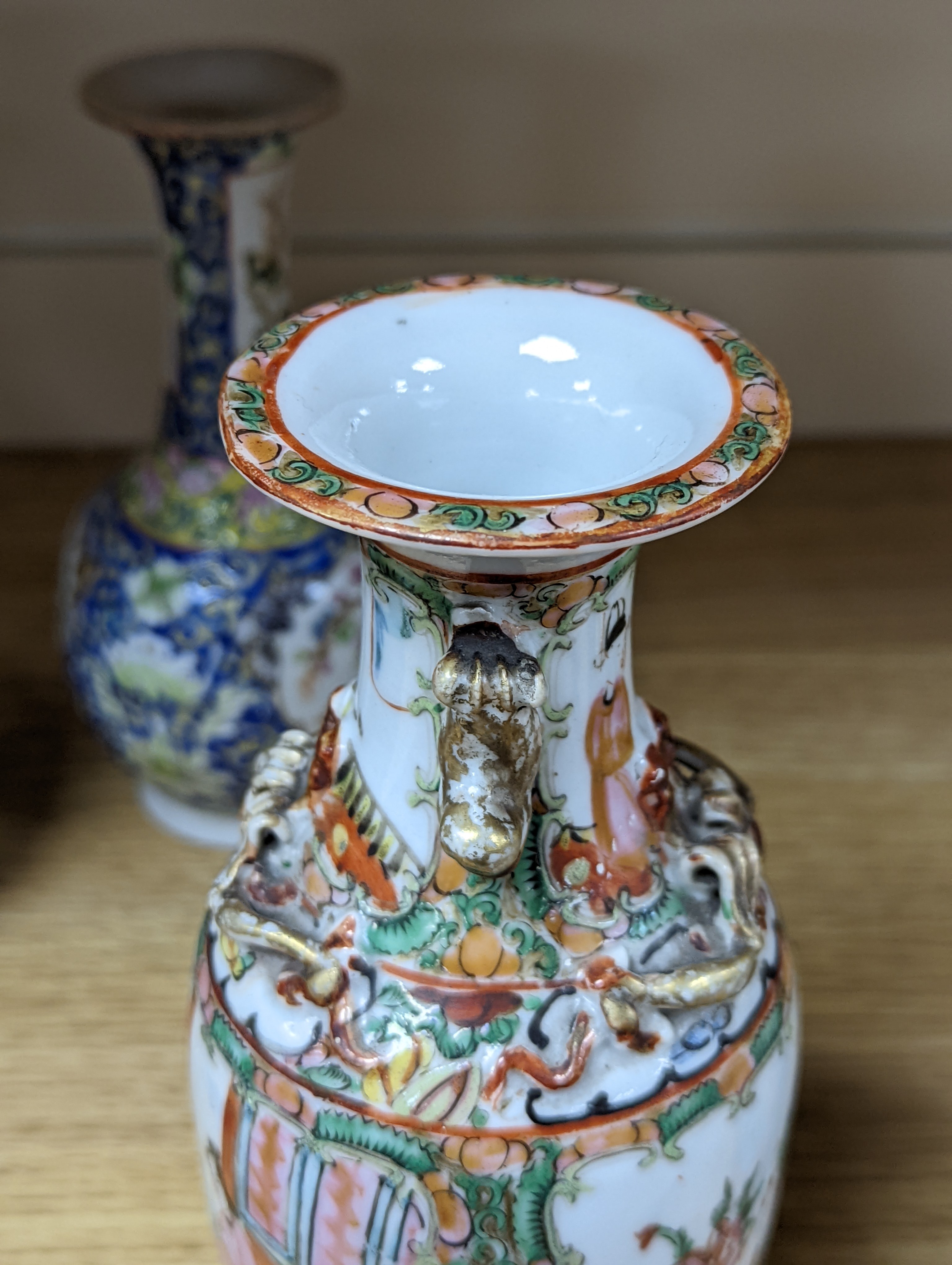 Four 19th century Chinese famille rose vases, 21cm
